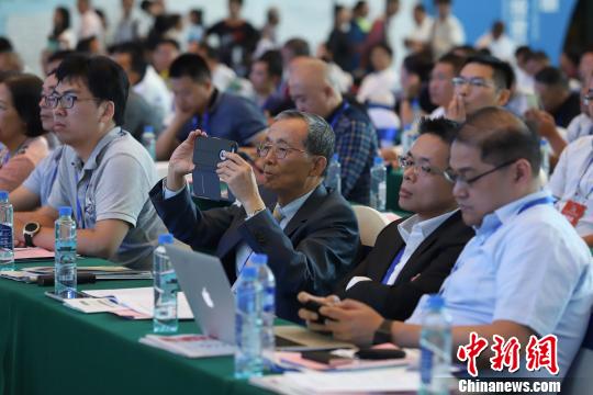 研討會現(xiàn)場圖?！■暮陚?攝