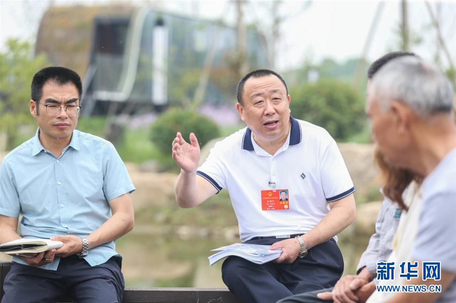 （新華全媒頭條·兩會精神看落實·圖文互動）（2）整體謀劃、系統(tǒng)升級、全面提升——落實全國兩會精神織牢織密公共衛(wèi)生防護網(wǎng)